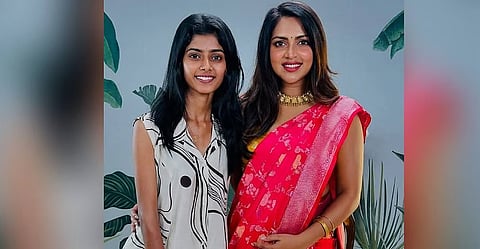 Clare Maria Sebastian with Amala Paul after helping the actor into a sari.