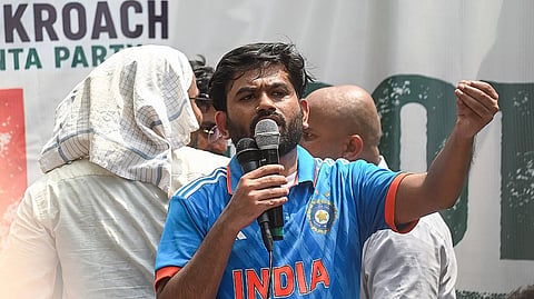 Cockroach Janta Party (CJP) founder Abhijeet Dipke speaks during a protest at Jantar Mantar in New Delhi on Saturday, June 6, 2026