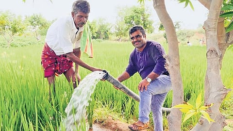 A filled pond after desilting efforts improved its water storage
