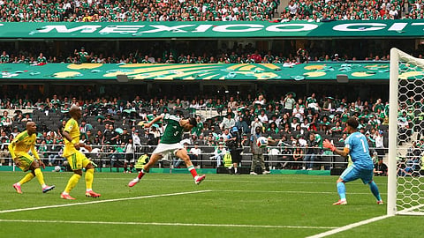 Mexico's Raul Jimenez scores their second goal against South Africa in the FIFA World Cup Group A match at the Estadio Azteca, Mexico City, Mexico