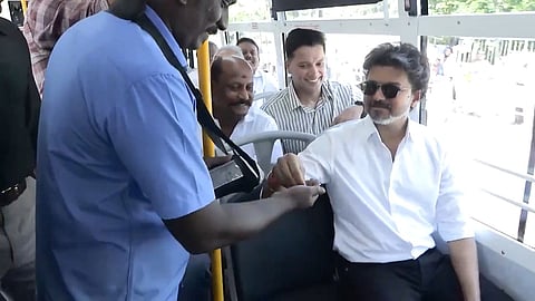 Tamil Nadu CM Joseph Vijay boards a bus