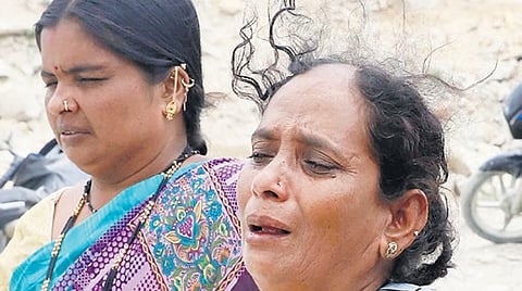 Family members of Ramu arrive at the quarry following the tragedy