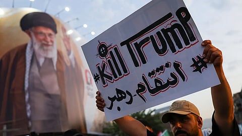 Mourners carry 'Kill Trump' banners at Ali Khamenei's funeral