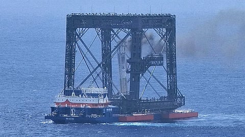 a drone photo shows the successful capture of the returned first stage of Long March-10B carrier rocke