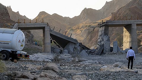 A heavily-damaged bridge which was hit by a US strike is pictured along the road connecting Roudan and Bandar Abbas in southern Iran.