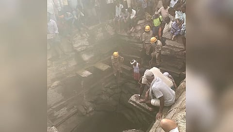 People gather around the open well on the premises of Kalleshwara Temple