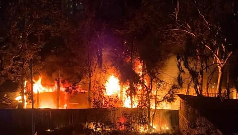The garage premises in Thanisandra, where more than 25 cars were gutted in an accidental fire.