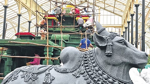 Preparations on in full swing for the 12-day flower show, which begins on August 6, at the Glass House in Lalbagh on Tuesday.