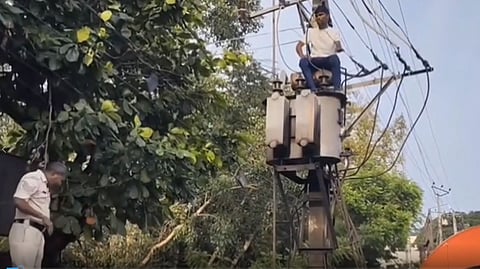 Man Climbs Electricity Transformer in Ballari