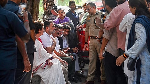 Lok Sabha LoP Rahul Gandhi interacts with police personnel at Akashvani Bhawan during the INDIA bloc-led protest march from Parliament House to Nirvachan Sadan