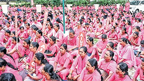 ASHA workers protest seeking fulfilment of their demands in Shivamogga.