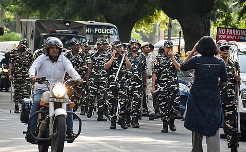 Security personnel keep vigil as part of heightened security arrangements by Delhi Police ahead of a proposed protest by the Cockroach Janta Party (CJP), in New Delhi