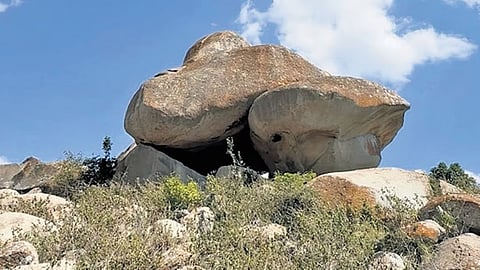 Painting belonging to the Mesolithic Age at a hill at Neelagund village in Gadag district