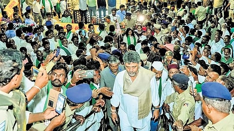 Chief Minister DK Shivakumar arrives to garland the statue of Rani Chennamma before addressing the farmers, at Kittur in Belagavi district on Saturday.