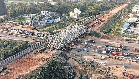 Weighing around 245 tonnes each, the girders would allow road and rail traffic to move independently