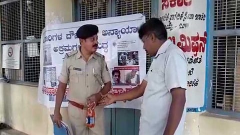 ಸೀಮೆಎಣ್ಣೆ ಸುರಿದು ಬೆಂಕಿ ಹಚ್ಚಿಕೊಂಡು ಆತ್ಮಹತ್ಯೆ ಮಾಡಿಕೊಳ್ಳುವುದಾಗಿ ಬೆದರಿಕೆಯೊಡ್ಡಿದ ಎಎಸ್ಐ