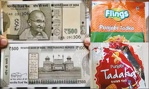சிப்ஸ் பாக்கெட்டுகளையும் அதில் இருந்து ரூ.500 நோட்டையும் படத்தில் காணலாம்.