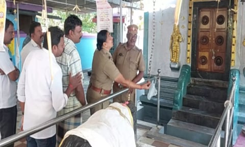 கொள்ளை நடந்த கோவிலை இன்ஸ்பெக்டர் ஜானகி ஆய்வு செய்தபோது எடுத்த படம் 