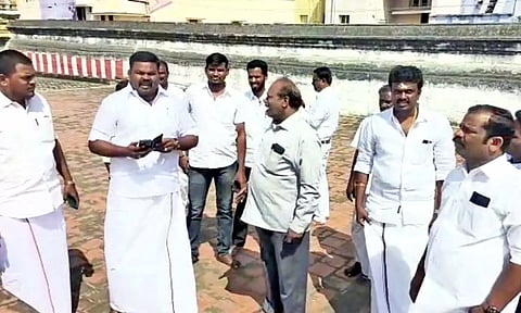 சங்கரன்கோவில் சங்கரநாராயண சுவாமி கோவில் கும்பாபிஷேக பணிகளை ராஜா எம்.எல்.ஏ. ஆய்வு செய்த காட்சி.