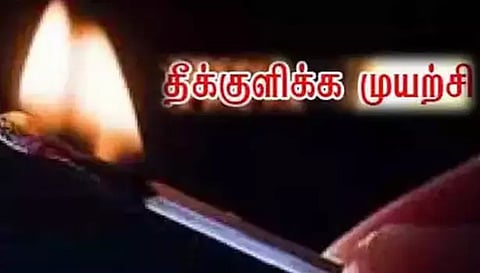ஓமலூர் கோர்ட்டு முன்பு குடும்பத்துடன் தீக்குளிக்க முயன்ற பெண்