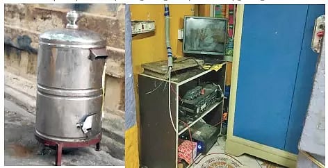 உடைக்கப்பட்ட உண்டியலையும், டேபிளில் இருந்த கம்ப்யூட்டர் ஹார்ட்டிஸ்க் காணாமல் போயிருப்பதையும் படத்தில் காணலாம்.