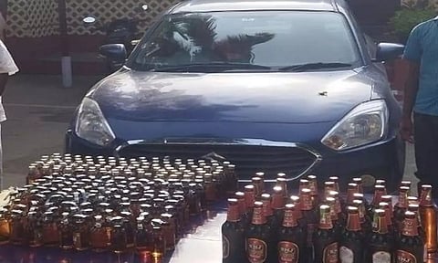 மது பாட்டில் கடத்திய 3 பேர் கைது