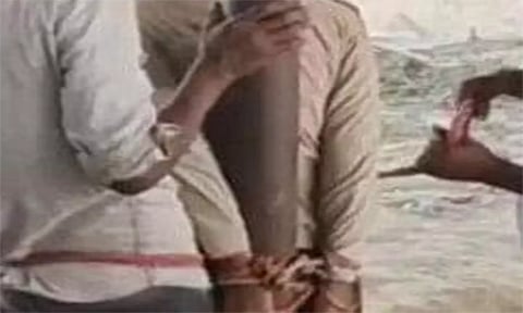 வட மாநில வாலிபரை கம்பத்தில் கட்டி வைத்த பொதுமக்கள்