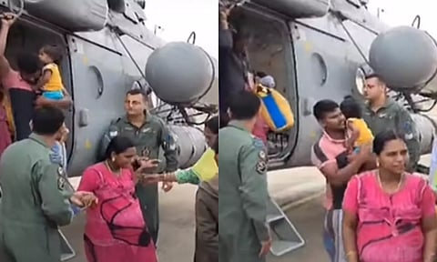 ரெயிலில் சிக்கியிருந்த கர்ப்பிணி ஹெலிகாப்டர் மூலம் மீட்பு