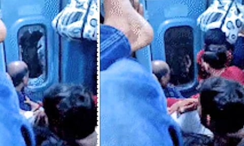 முன்பதிவு செய்தும் இருக்கை கிடைக்காததால் ரெயிலின் கதவு கண்ணாடியை உடைத்த பயணி