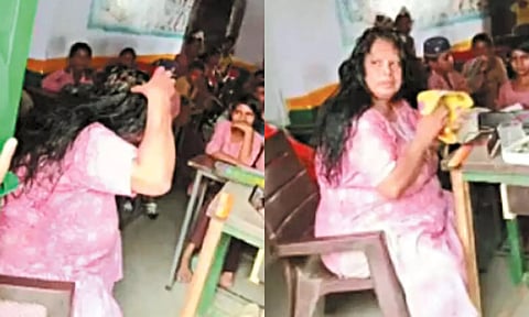 VIDEO: வகுப்பறையில் பாடல் கேட்டபடியே தலைமுடிக்கு எண்ணெய் தேய்த்த ஆசிரியை சஸ்பெண்ட்