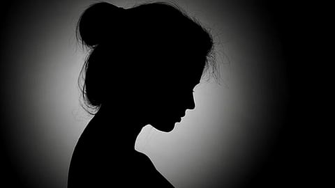 23-year-old woman in distress after excreting through genitals after cesarean section