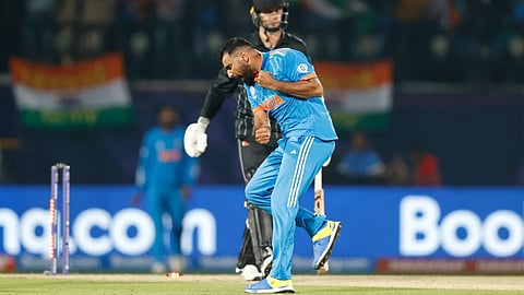 India fast bowler Mohammed Shami celebrating a New Zealand wicket in ICC ODI cricket world cup match in Dharamsala on October 22, 2023.