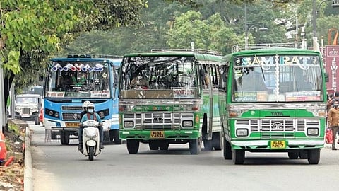 Private buses on a Kerala road.