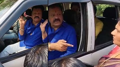 പ്രവർത്തകരെ കാറിലിരുന്ന് ശാസിക്കുന്ന സുരേഷ് ഗോപി.