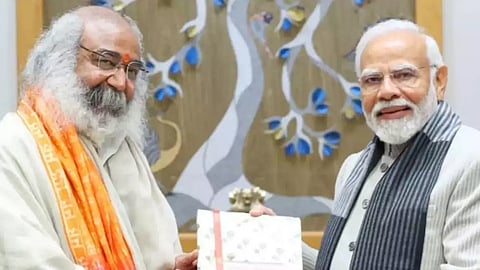 Acharya Pramod Krishnam with Prime Minister Narendra Modi