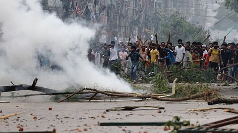 bangladesh imposes nationwide curfew as 105 die in protests
