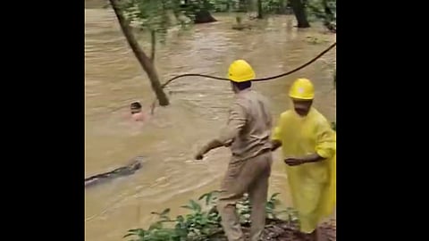 electric wire snapped lineman jumps into stream