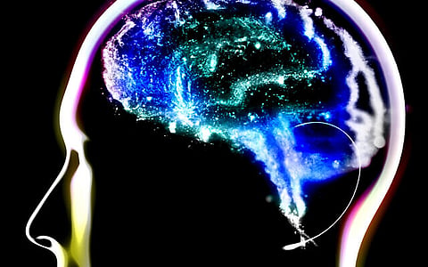 An illustrative image of a human brain with degeneration, which is denoted in green. (Naeblys via iStock by Getty Images)