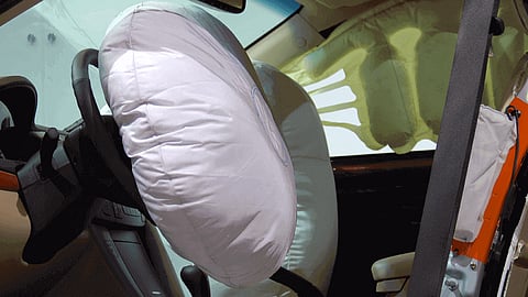 Airbag in parked car explodes; young man dies