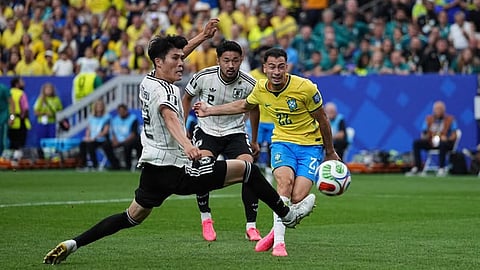 Brazil survive Japan with stoppage-time winner