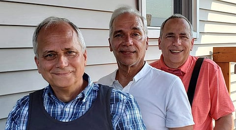 Former Cardinal Robert Prevost, now Pope Leo XIV (left), and his brothers John Prevost (center) and Louis Prevost.