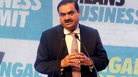 Adani repays $2.15 bn loan taken pledging shares, prepays another $500 mn loan for Ambuja cement
