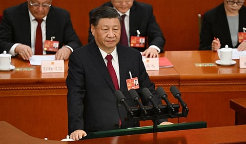 Xi vows to build Chinese military into a "Great Wall of steel" in first speech of new presidential term