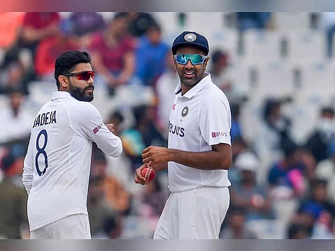 Ashwin , Jadeja