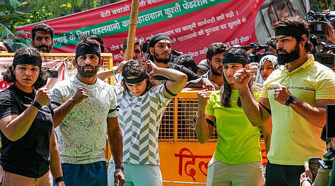 Protesting wresters wear black bands as mark of protest, call it a 'Black Day