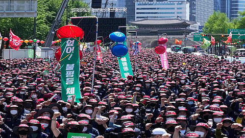 On May Day, workers rally for better labour conditions