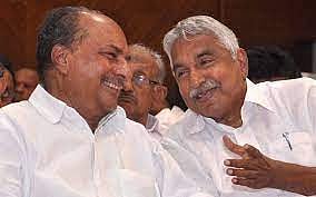 AK Antony with Oommen Chandy File Photo
