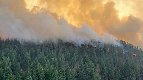 Wildfires race through Washington state