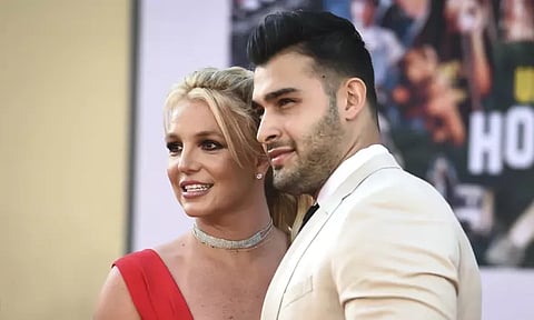 Britney Spears' husband files for divorce, source tells AP