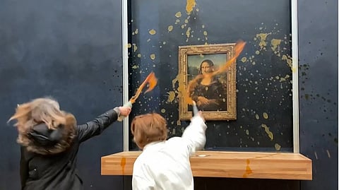 Activists throw soup at Mona Lisa in climate protest